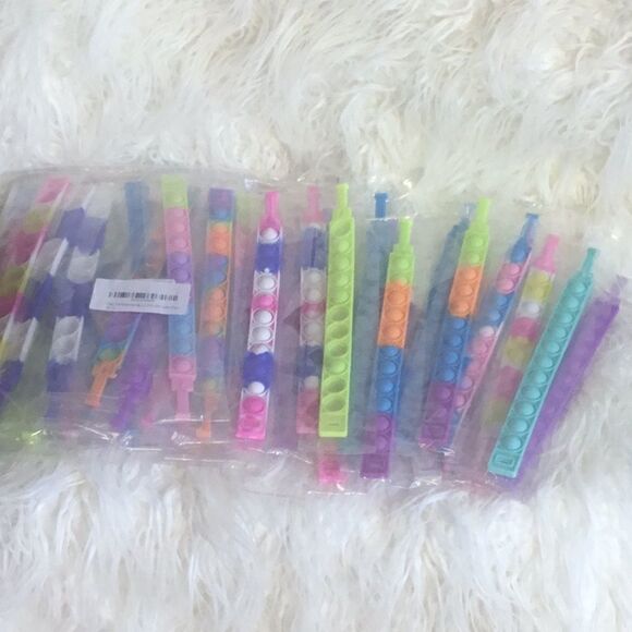 NEW STOCK 38 pieces of popping bracelets - Picture 2 of 4